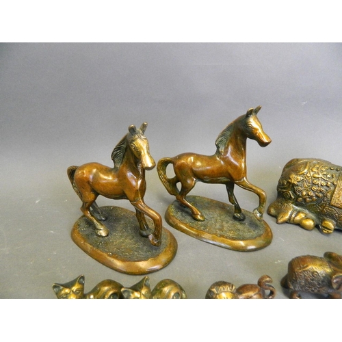 220 - A collection of Eastern cold lacquered bronze figures in the form of a ceremonial cow, horses, stags... 