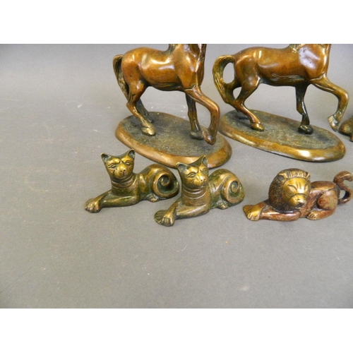 220 - A collection of Eastern cold lacquered bronze figures in the form of a ceremonial cow, horses, stags... 