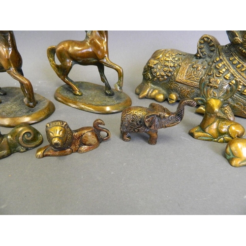 220 - A collection of Eastern cold lacquered bronze figures in the form of a ceremonial cow, horses, stags... 