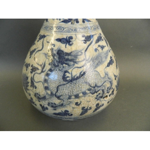 222 - A large Chinese crackle glazed garlic head shaped porcelain vase with twin kylin and lotus flower de... 