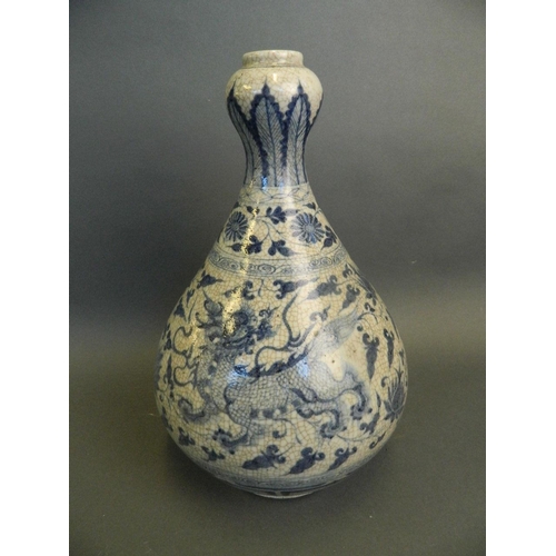 222 - A large Chinese crackle glazed garlic head shaped porcelain vase with twin kylin and lotus flower de... 