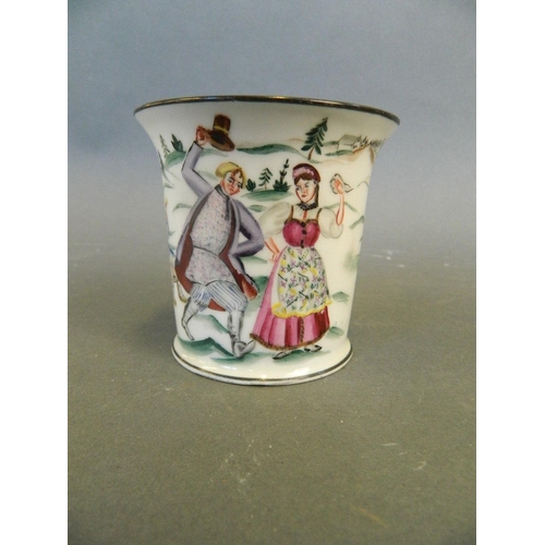 233 - An early C20th Soviet Russian enamelled porcelain beaker with painted decoration of a dancing couple... 