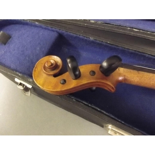 241 - A violin with two piece back, in a fitted case with bow, 22