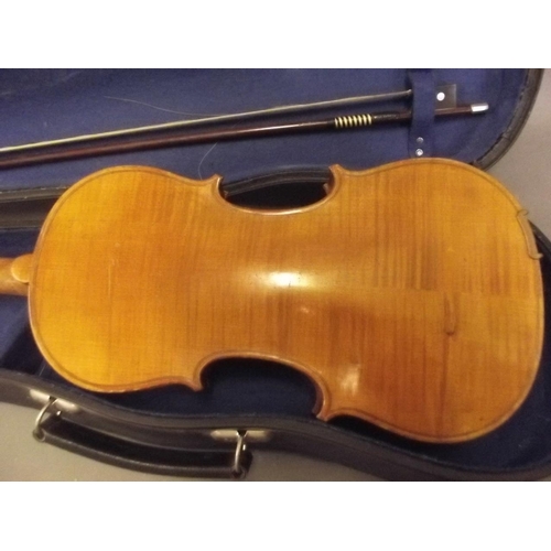 241 - A violin with two piece back, in a fitted case with bow, 22