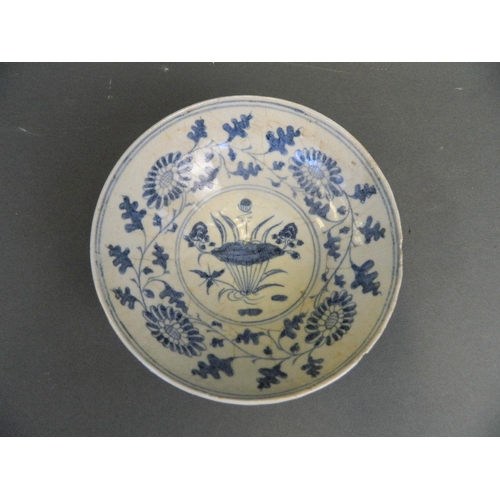 243 - A Chinese Ming style blue and white porcelain bowl with painted floral decoration, 6