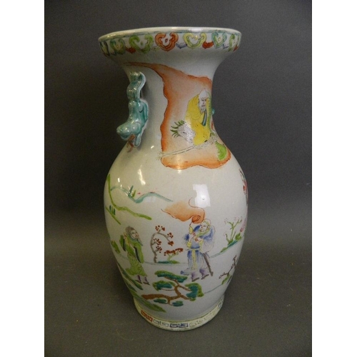 244 - A Chinese Republic porcelain vase with kylin handle decorated in the famille verte palette with figu... 