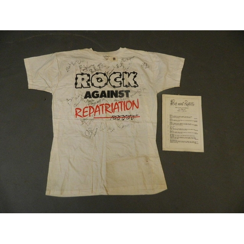 250X - An original 'Rock Against Repatriation' t-shirt, signed by all the artists who participated, togethe... 