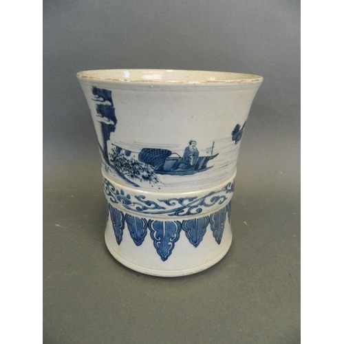 255 - A Chinese blue and white porcelain brush pot decorated with figures in a garden and fishing scenes, ... 