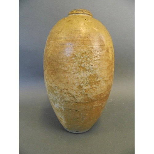 256 - An early studio pottery jar with blistered salt glaze, 10½