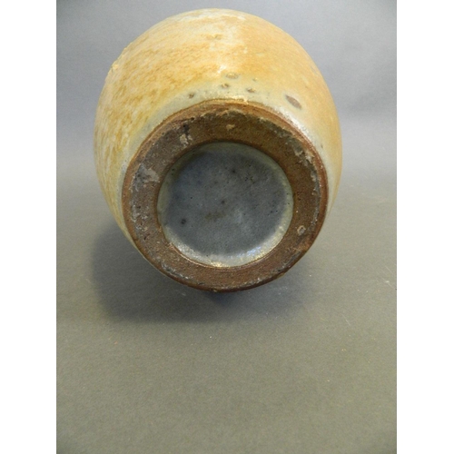 256 - An early studio pottery jar with blistered salt glaze, 10½