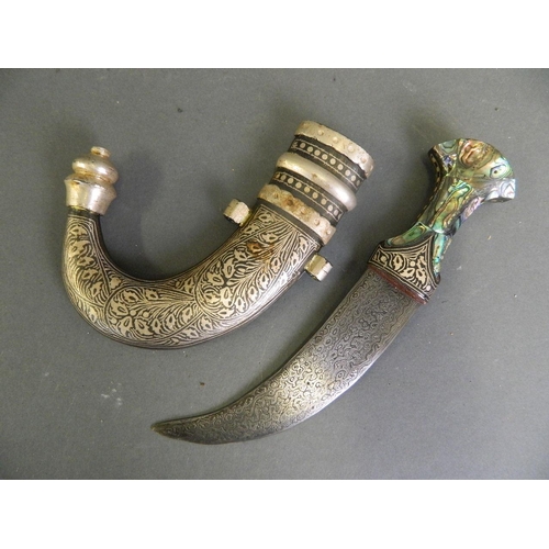 265 - A small Persian jambiya with niello style sheath and an abalone set handle, 8½