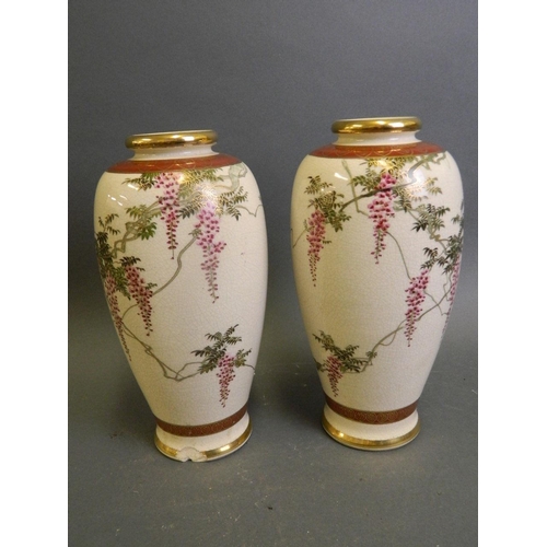 269 - A pair of Japanese Satsuma vases decorated with trailing wisteria, 9