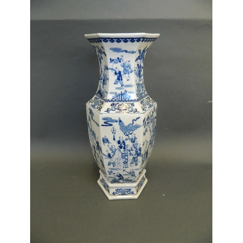 274 - A Chinese blue and white porcelain vase of hexagonal form decorated with figures in procession, 6 ch... 