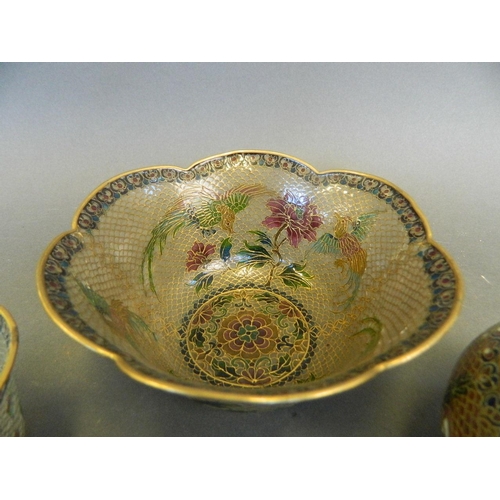 278 - Two leaf pattern plique-à-jour bowls with floral and bird decoration, together with a similar lidded... 