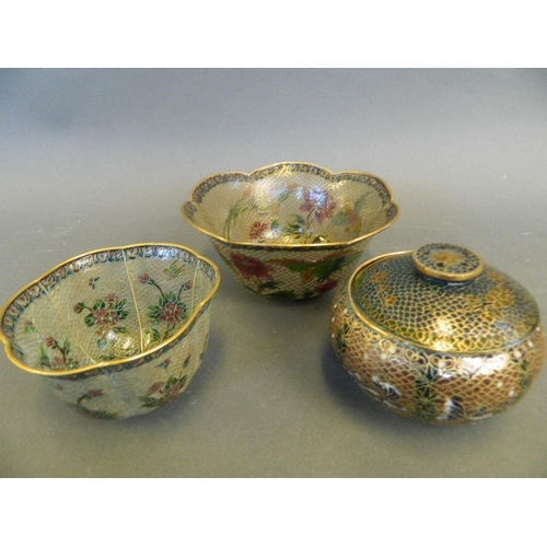 278 - Two leaf pattern plique-à-jour bowls with floral and bird decoration, together with a similar lidded... 