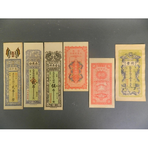 280 - A collection of six assorted facsimile Chinese bank notes, longest 10