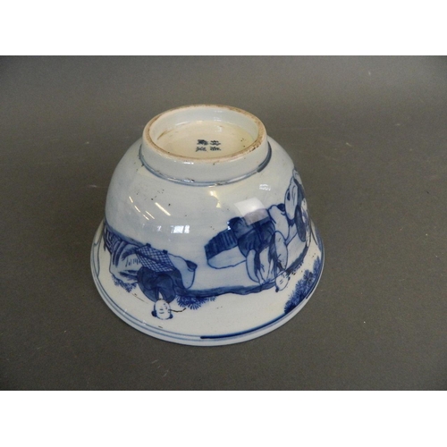 287 - A Chinese blue and white porcelain rice bowl decorated with the Eight Immortals in a garden taking t... 