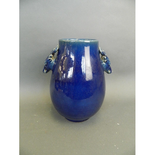 290 - A Chinese deep blue glazed porcelain vase with twin stag mask handles, 10½