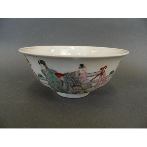 291 - A Chinese polychrome enamel rice bowl decorated with women in a garden, 4 character mark to base, 6½... 