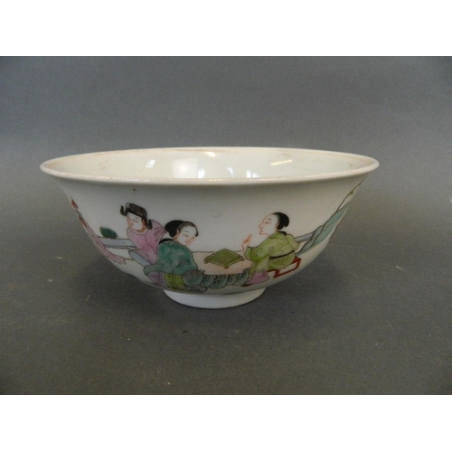 291 - A Chinese polychrome enamel rice bowl decorated with women in a garden, 4 character mark to base, 6½... 