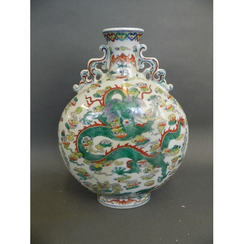 294 - A Chinese Doucai enamel moon flask with scrolling dragon handles and painted dragon decoration, seal... 