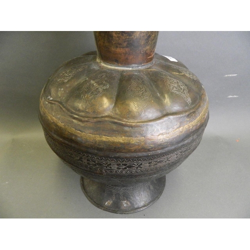 50E - A large Islamic bronze vase with engraved foliate decoration, 20½