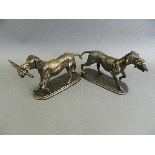 77 - A pair of cast metal doorstops in the form of gundogs with caught pheasant