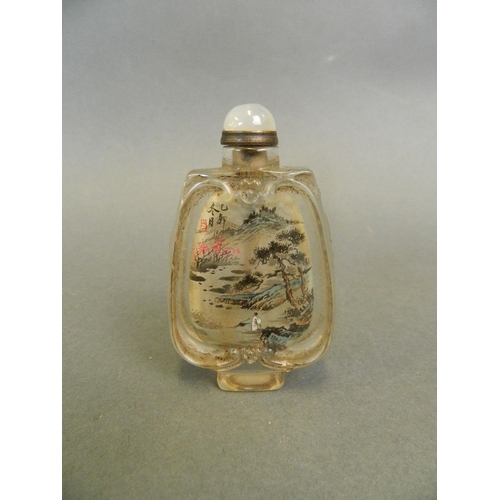 82 - A Chinese glass snuff bottle with reverse painted decoration of figures in a landscape, 3