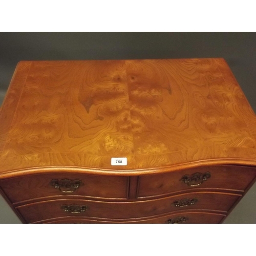 855 - A Georgian style elm veneered serpentine fronted chest of two over three drawers, raised on bracket ... 