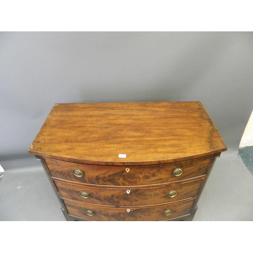 858 - A C19th figured mahogany bow fronted chest of three graduated drawers, raised on swept supports, 43