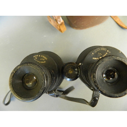 96 - A pair of WWII military binoculars by Barr & Stroud, in a leather case, 9½