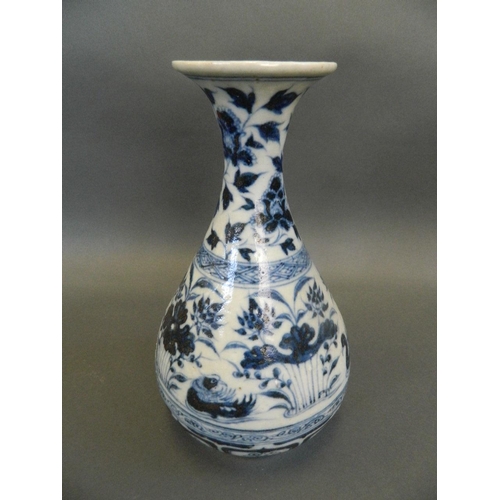 103 - A Chinese Ming style blue and white porcelain pear shaped vase decorated with waterfowl in a lotus p... 