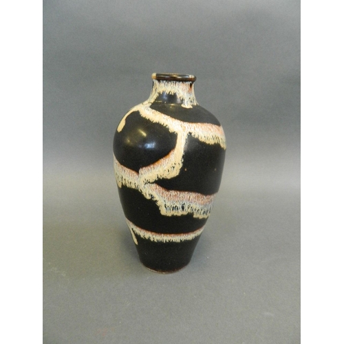 115 - A Chinese Cizhou kiln meiping vase with drip glaze decoration, 6½