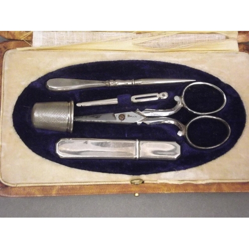 133 - A late C19th manicure set in a leather case, marked 'Maison Charbonnel, Grenoble', 6