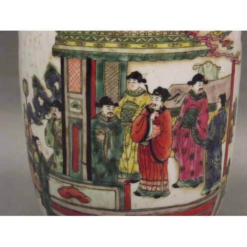 137 - A Chinese famille verte vase with enamel decoration of figures under a gazebo, 6 character mark to b... 