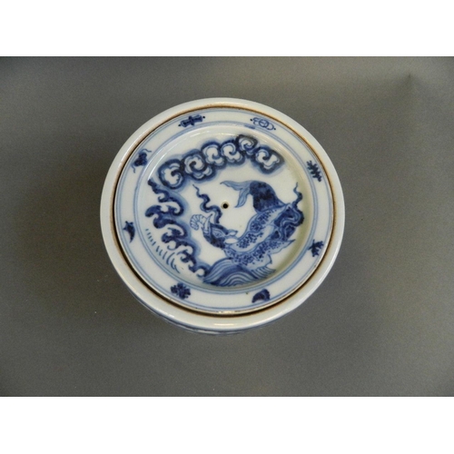 142 - A Chinese blue and white porcelain pot and cover decorated with mythical beasts, 6 character mark to... 