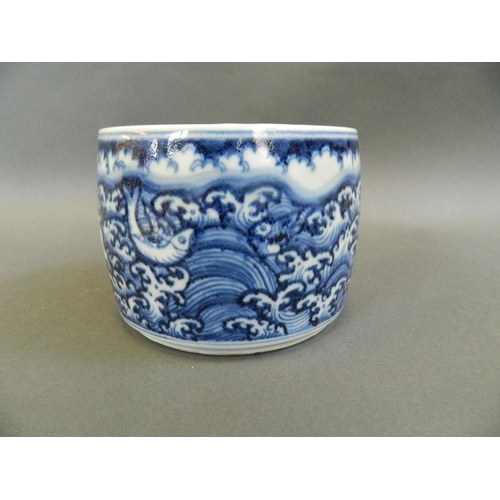 142 - A Chinese blue and white porcelain pot and cover decorated with mythical beasts, 6 character mark to... 