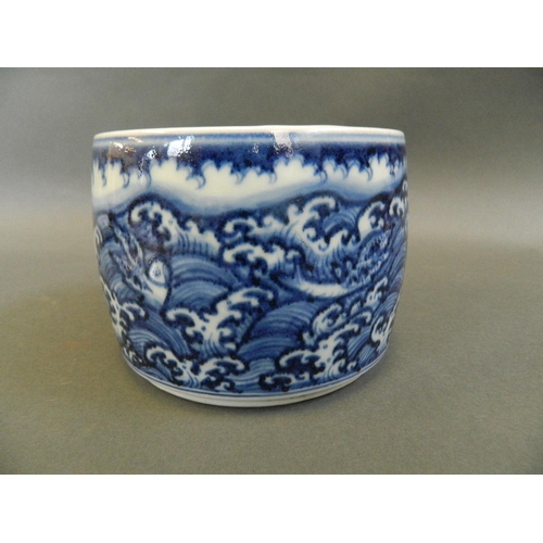 142 - A Chinese blue and white porcelain pot and cover decorated with mythical beasts, 6 character mark to... 