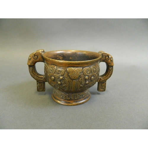 15 - A Chinese archaic bronze censer with twin elephant mask handles, 3