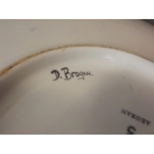 150Q - A Poole pottery charger decorated with a galleon, marked to base 'S. Aegean', signed 'D. Brogan', 14... 