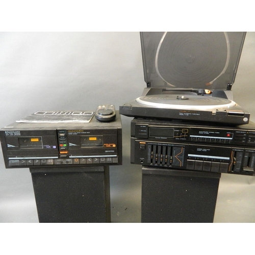 18 - A Marantz sound system with record player, radio mixer and tape-tape player, together with a pair of... 