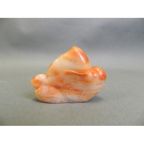 194 - A Chinese carved soapstone seal in the form of peaches, 6 character mark verso, 3