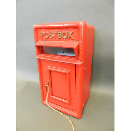 22 - A cast metal post box with keys, 17½