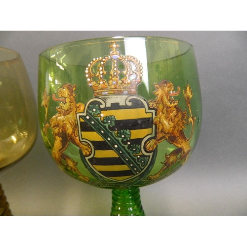 229 - Two large Bavarian coloured glass rummers, one green and one amber, both bearing enamelled coat of a... 