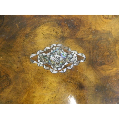 250B - A Victorian walnut jewellery box with Mother of Pearl inlaid decoration and fitted interior, contain... 