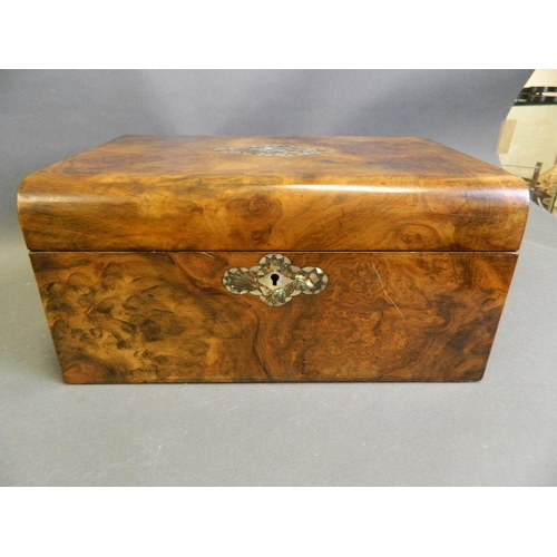 250B - A Victorian walnut jewellery box with Mother of Pearl inlaid decoration and fitted interior, contain... 