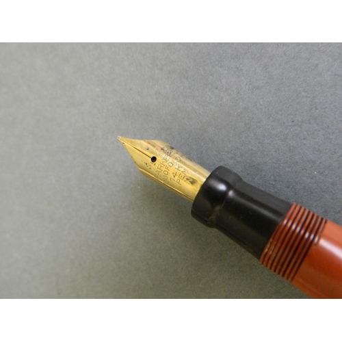 250L - A 1930s Parker Duofold fountain pen with 14ct gold nib, together with a matching 1980s Sheaffer prop... 