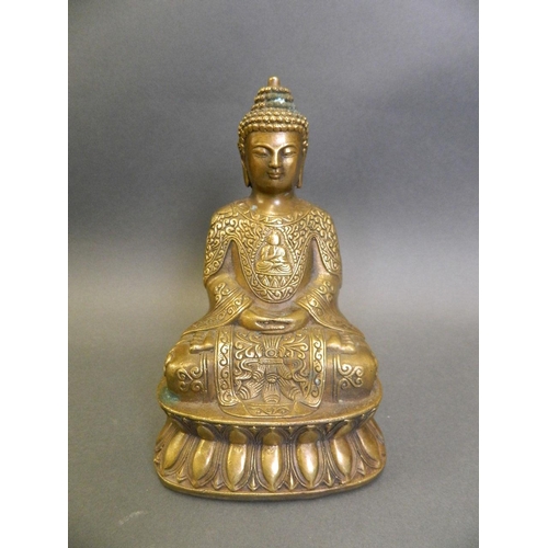 27 - A Chinese bronze figure of Buddha seated on a lotus throne, 4 character mark to base, 6½