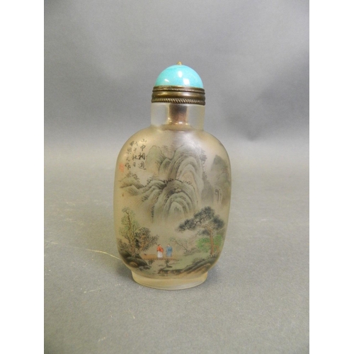 272 - A Chinese glass snuff bottle with reverse painted decoration of figures on a river, 3½