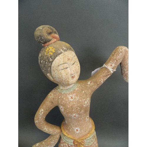 275 - A Chinese Tang style painted terracotta and gilt figure of a dancing geisha, 18½